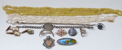 A hallmarked silver fob with yellow metal shield pearl necklace, quartz necklace,