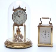 A 20thC English brass carriage clock in corniche style case,