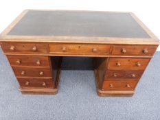 A 19thC mahogany pedestal desk with three drawers to the top and three to each pedestal W133 x D72