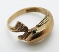 A 9ct gold ring in the form of a dolphin, size M, 2.