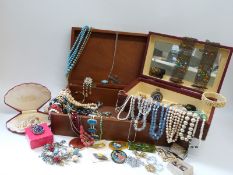 A collection of costume jewellery including a three strand faux pearl necklace with 9ct gold clasp,