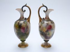 Royal Worcester Hadley Ware pair of pedestal ewers hand-decorated with flowers,