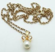 A 9ct gold chain and a 9ct gold pendant set with a pearl, 5.