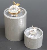 Two Swarovski Crystal cut glass gold and silver plated trinket boxes in the form of apples,