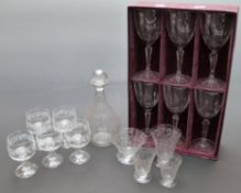 Baccarat decanter with four similarly decorated glasses together with a boxed set of six French cut