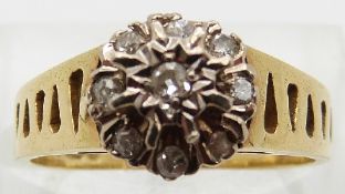 An 18ct gold ring set with a diamond in a platinum setting,