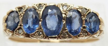A 9ct gold ring set with five graduated oval sapphires and diamonds,