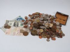 A collection of sundry UK and overseas coins comprising USA, Australia and pre-Euro holiday change,
