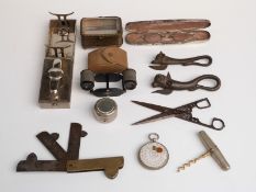 A selection of sundry items including glasses and white metal case,