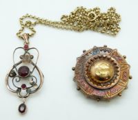 A 9ct gold chain an Edwardian 9ct gold pendant set with garnets and a Victorian yellow metal brooch,