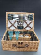 Four person wicker picnic hamper,
