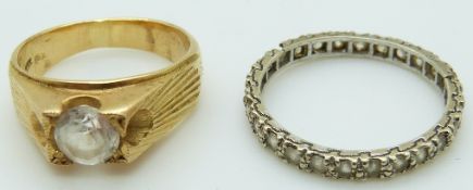 An 18k gold ring set with paste and 9ct gold eternity ring