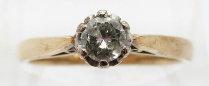 A 9ct gold ring set with a round cut diamond of approximately 0.