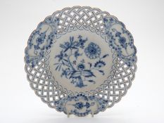 A Meissen plate with pierced rim