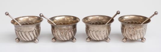 Edward VII set of four hallmarked silver open salts and spoon,