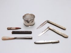 A hallmarked silver napkin ring,