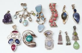 Twelve silver pendants including sapphire set, ruby, amethyst, coral, emerald,