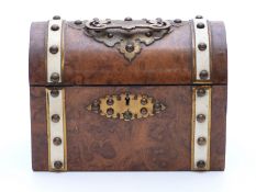 Walnut dome-topped casket with gilt metal and studded decoration,