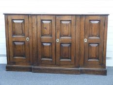 A 19thC panelled oak breakfront sideboard W154 x D35 x H90cm