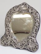 Victorian hallmarked silver framed bevelled edge heart shaped dressing table mirror decorated with