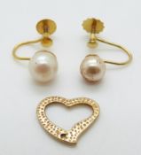 A pair of 9ct gold earrings set with a pearl to each by Lotus and a 9ct gold heart set with a