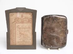 Hallmarked silver cigarette case, weight 73g and an Art Deco pewter photo frame,