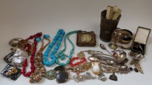 A large collection of costume jewellery including turquoise necklace, coral necklace, brooches,