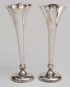 George V hallmarked silver trefoil vases, Sheffield 1913 and Birmingham 1905 respectively,
