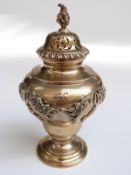 Edward VII hallmarked silver gilt and sugar caster with floral swags in relief,