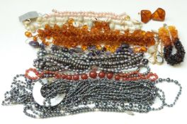 An amber bracelet, pressed amber necklace,