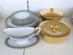 Royal Worcester 'Regency' dinner and teaware andgravy boat together with a pair of Goldware lidded