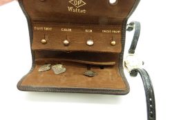 A set of 9ct gold studs, a 9ct gold cufflink and a 9ct gold watch, 16.