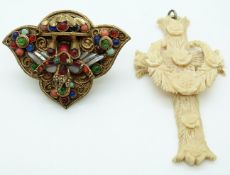 A gilt metal brooch set with cabochons, possibly Austro Hungarian,