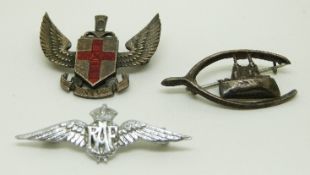 Three military brooches