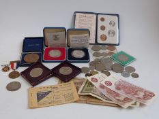 A collection of largely UK coins including uncirculated Coronation 1953 set, silver crowns,