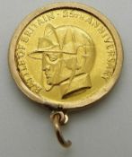 A 22ct gold Battle of Britain medallion in 9ct gold mount, 4.