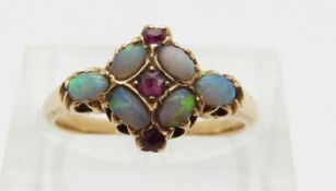Victorian 18ct gold ring set with opal cabochons and three rubies,