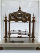 20thC brass Congreve rolling ball clock, marked to rear of frame 'made by hand J W Ingram,