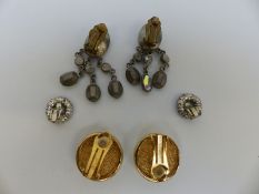 A pair of Christian Dior earrings and two pairs of paste earrings