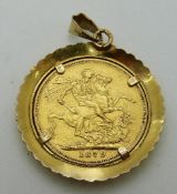 An 1879 gold full sovereign in a 9ct gold mount, 10.