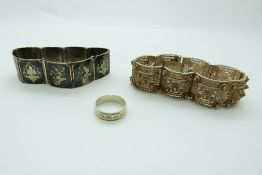 A silver filigree bracelet,