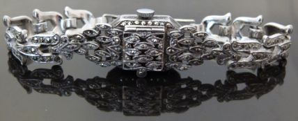 Angel German silver Art Deco style ladies wristwatch with gold hands and Arabic numerals,