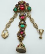A silver gilt brooch set with various coloured paste, possibly Austro-Hungarian, 26.55g, 10.5 x 3.