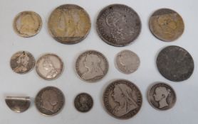A collection of UK silver coins, George I through to Victoria including George IV crown,
