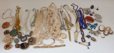 Silver brooch in the form of a butterfly by JA & S set with enamel, garnet beads,