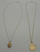 A 9ct gold St Christopher on a 9ct gold chain and a 9ct gold locket on a 9ct gold chain, 3.