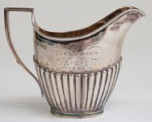 Victorian hallmarked silver cream jug with reeded decoration,