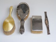 Yellow guilloché enamel and hallmarked silver handled brush,