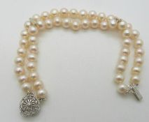 A two strand pearl bracelet with 9ct white gold clasp