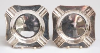 Two hallmarked silver ashtrays, both Birmingham 1963, one Walker & Hall the other Harman Brothers,